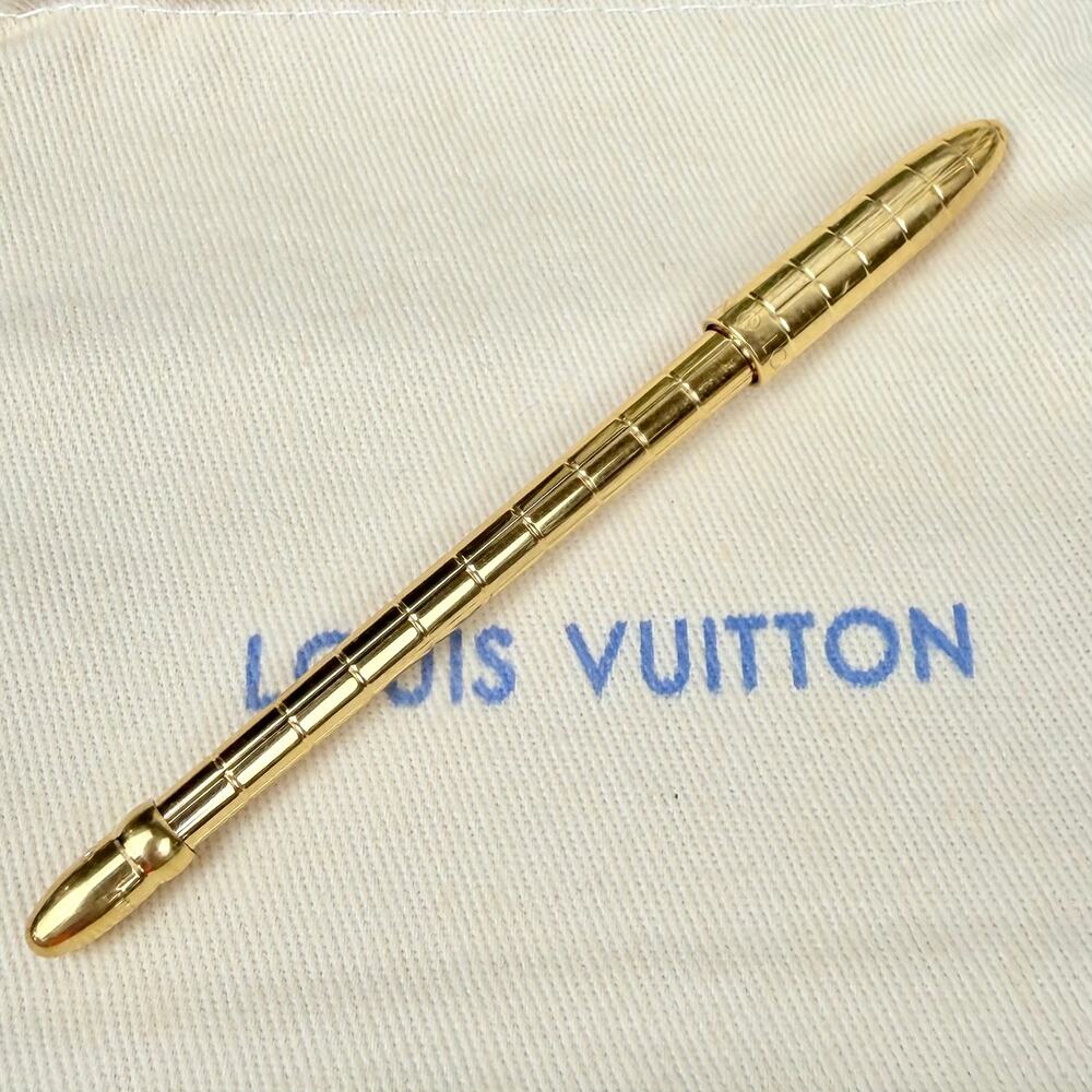 Louis Vuitton gold colored planner agenda ink pen! Good condition!